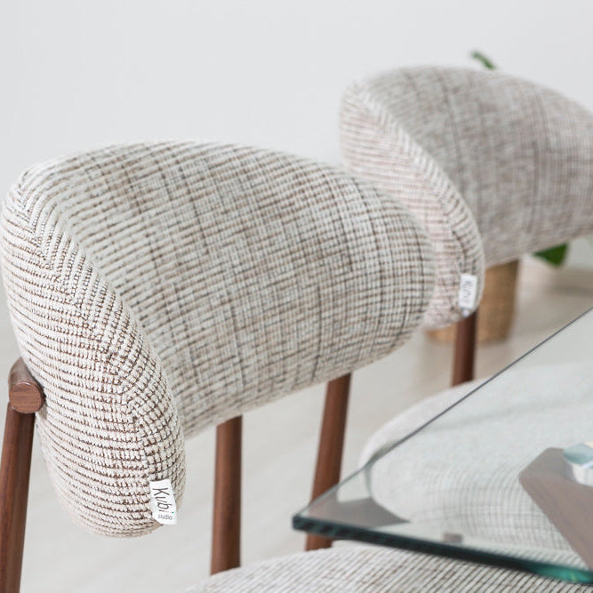 Moira – sedia in tessuto mélange con metallo effetto legno