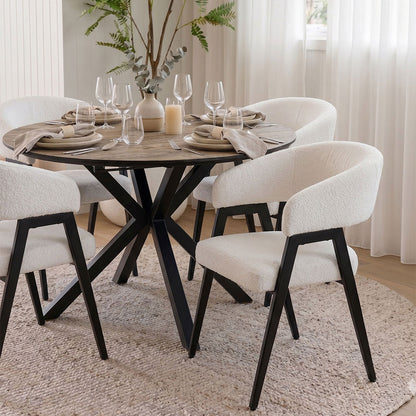 Vera – sedia in bouclé con gambe in metallo nero