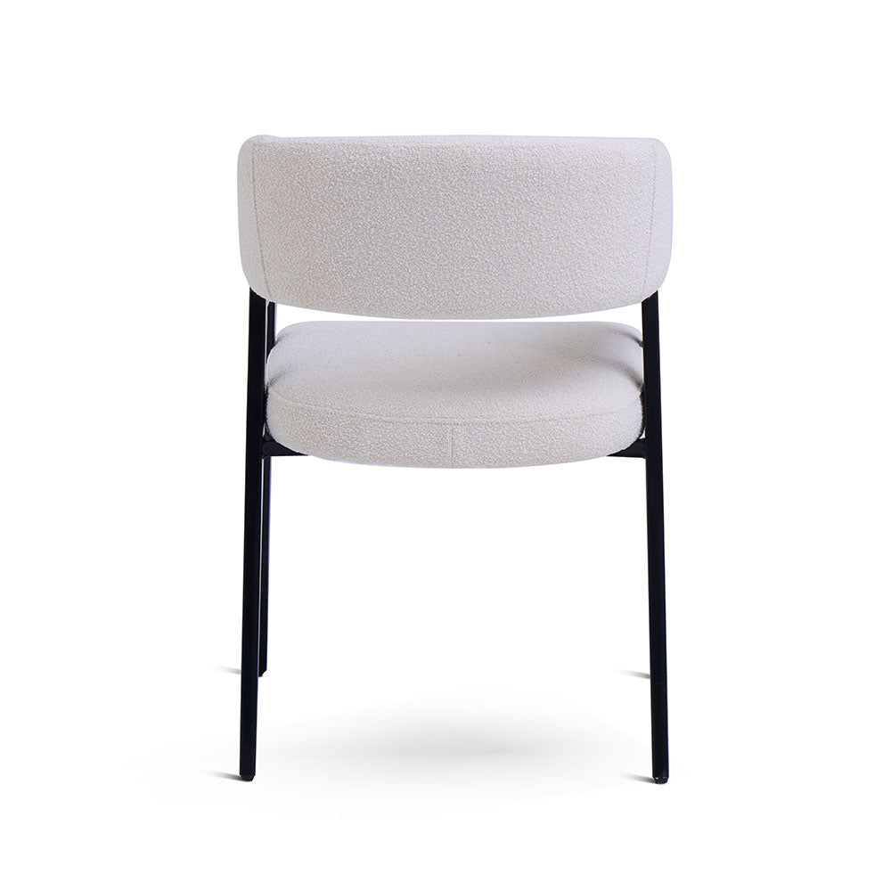 Vera – sedia in bouclé con gambe in metallo nero