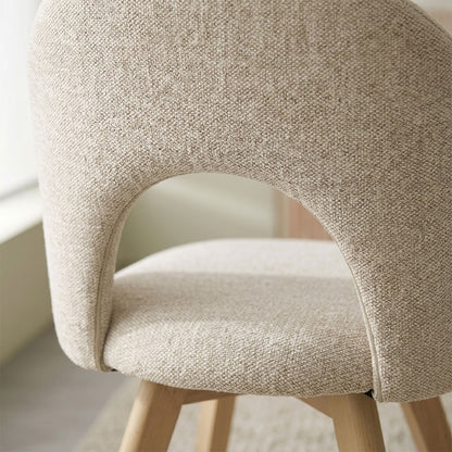 Margot – sedia imbottita in tessuto con gambe in legno